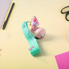 Various angles of colorful silicone cartoon character keychain
