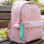 Detailed view of cute cartoon silicone keychain character with strap