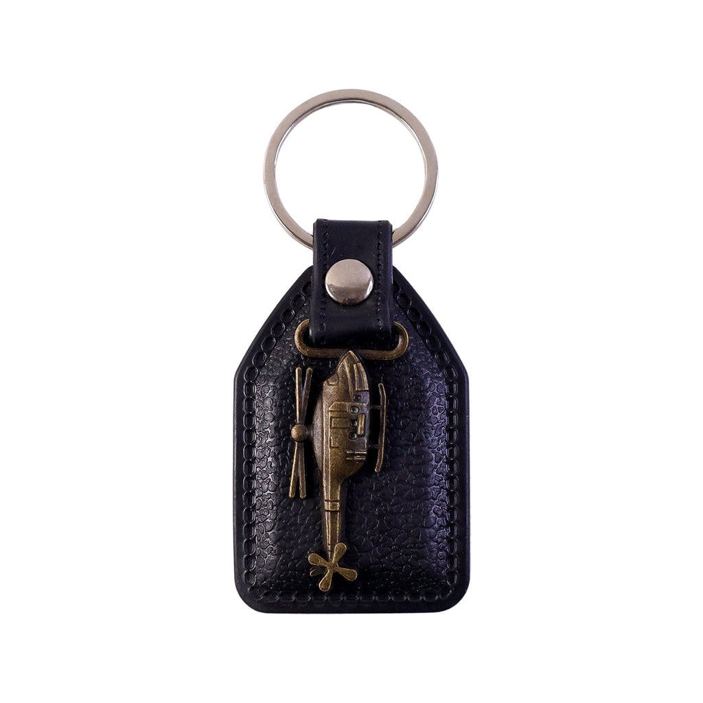 Leather texture and metal key ring details on sword keychain