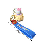Decorative silicone keychain showing cartoon cat riding toy car