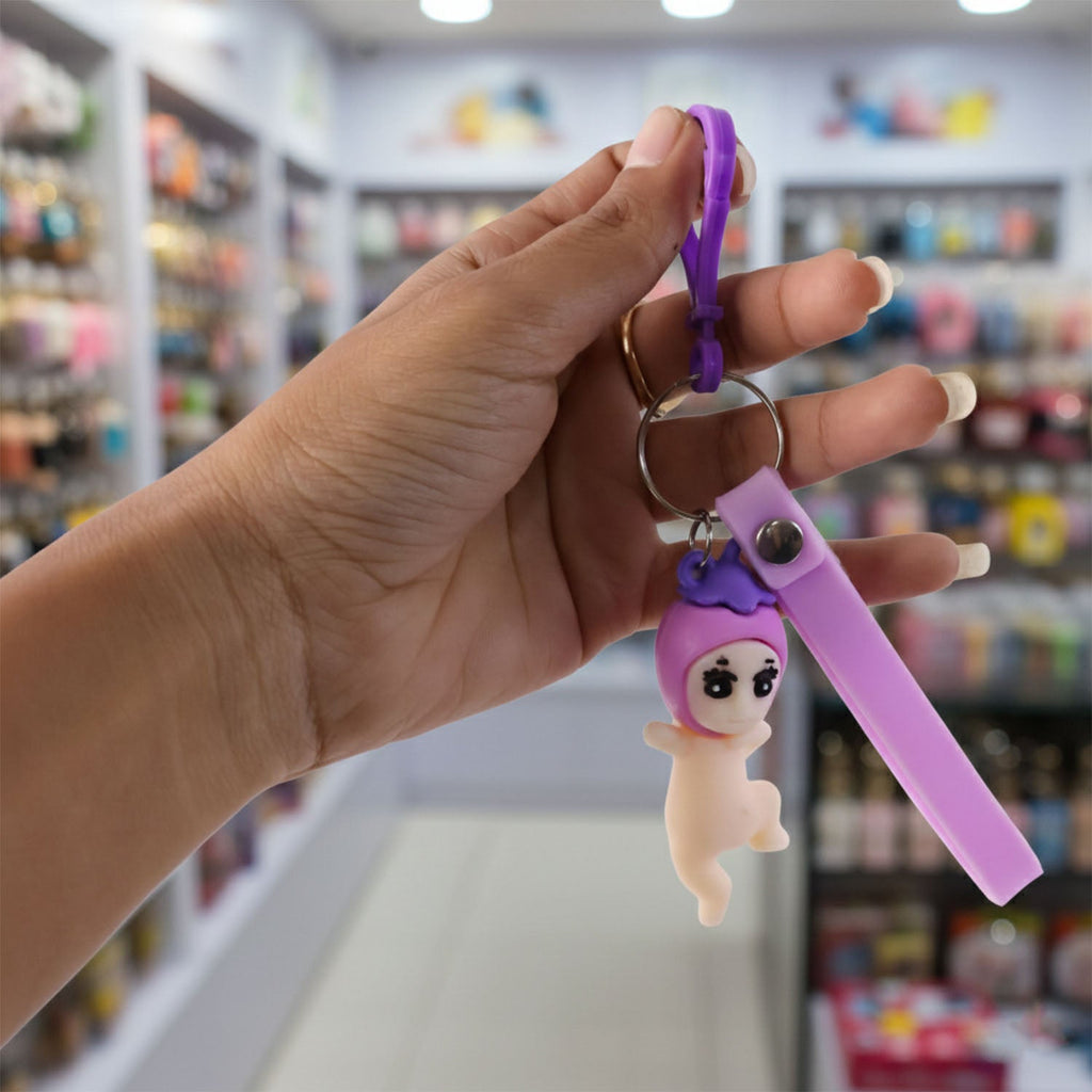 Close-up view of baby doll silicone keychain detail and texture
