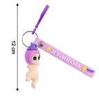 Size comparison showing compact baby doll silicone keychain