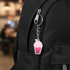 Decorative bubble tea keychain shown as both bag charm and key holder