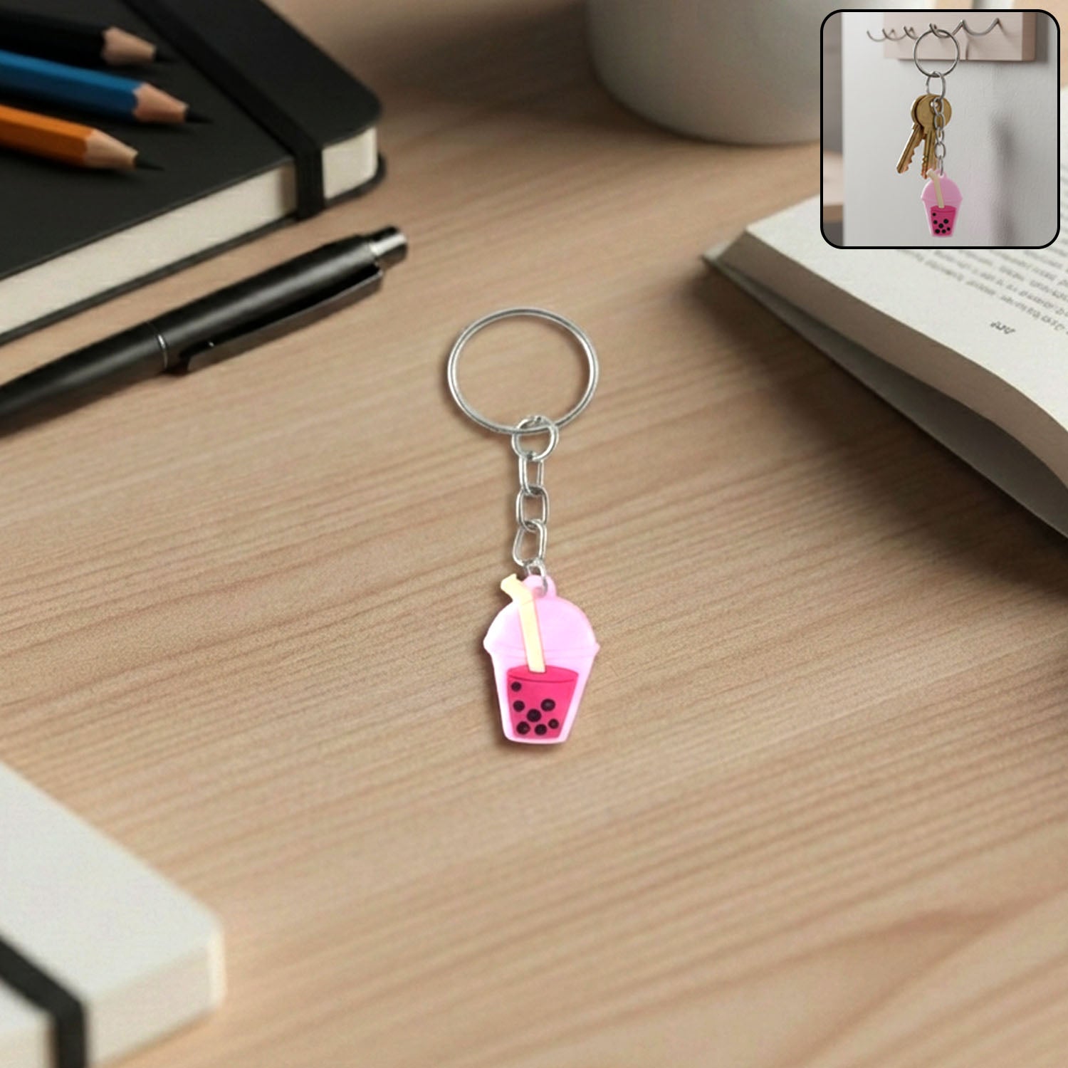 Cute bubble tea keychain with mini cup design hanging on a bag