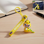 Cute cartoon dinosaur keychain with vibrant rainbow strap and metal clip hook