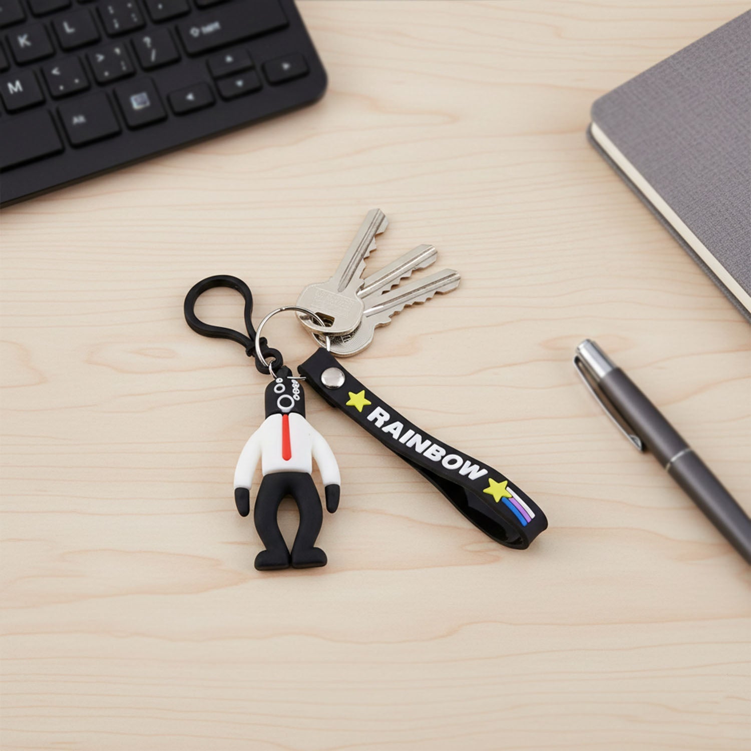 Cartoon key ring hanging from backpack zipper adding a colorful accent