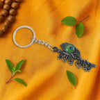 Radha Krishna metal keychain with sturdy ring and chain attached