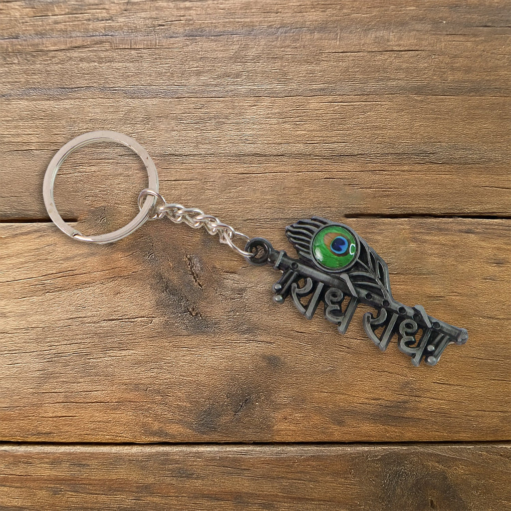 Detailed craftsmanship on Radha Krishna Radhe Radhe metal keychain
