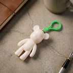 Multiple views of bear shape decorative keychain with clip hook