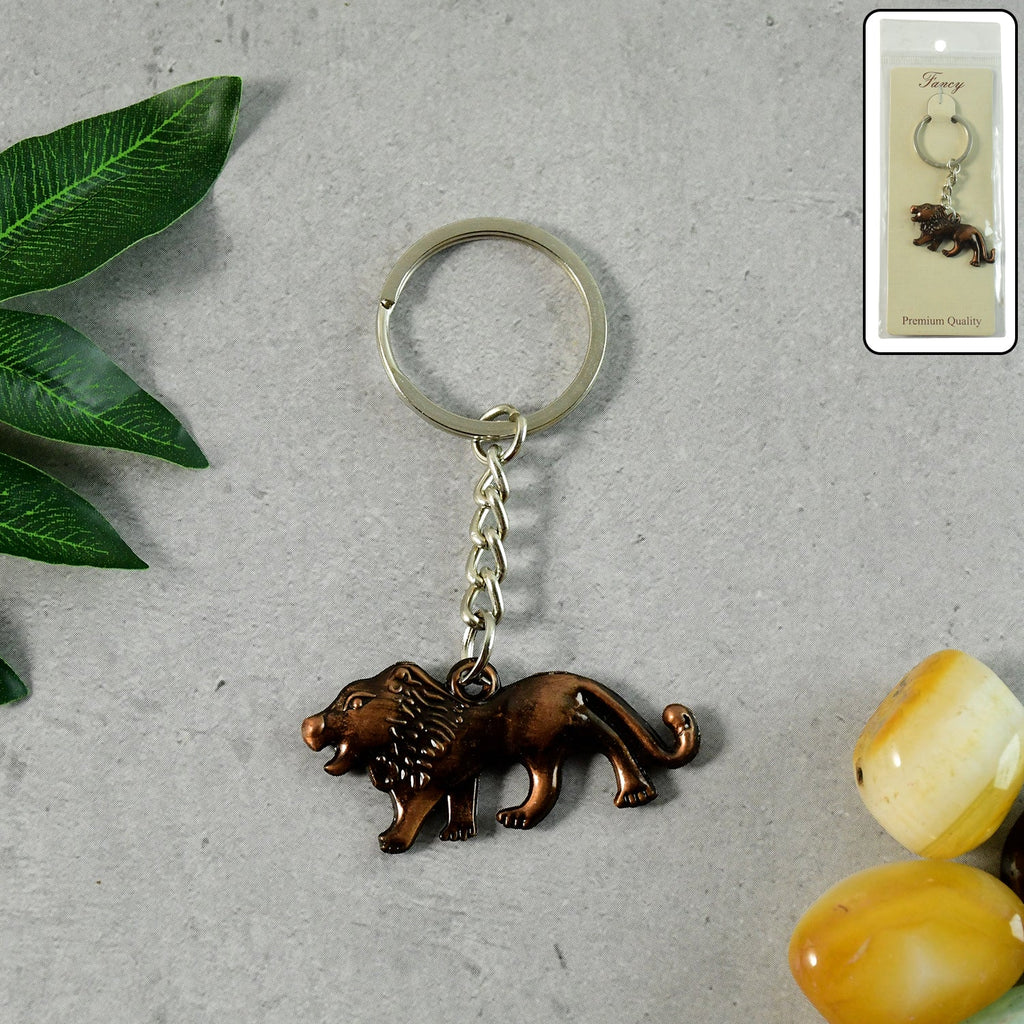 Walking lion metal keychain showcasing antique finish and detailed design