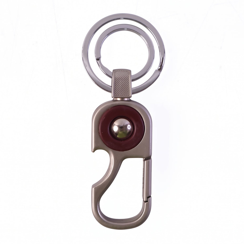 Modern design metal key holder that clips easily onto belts and bags.