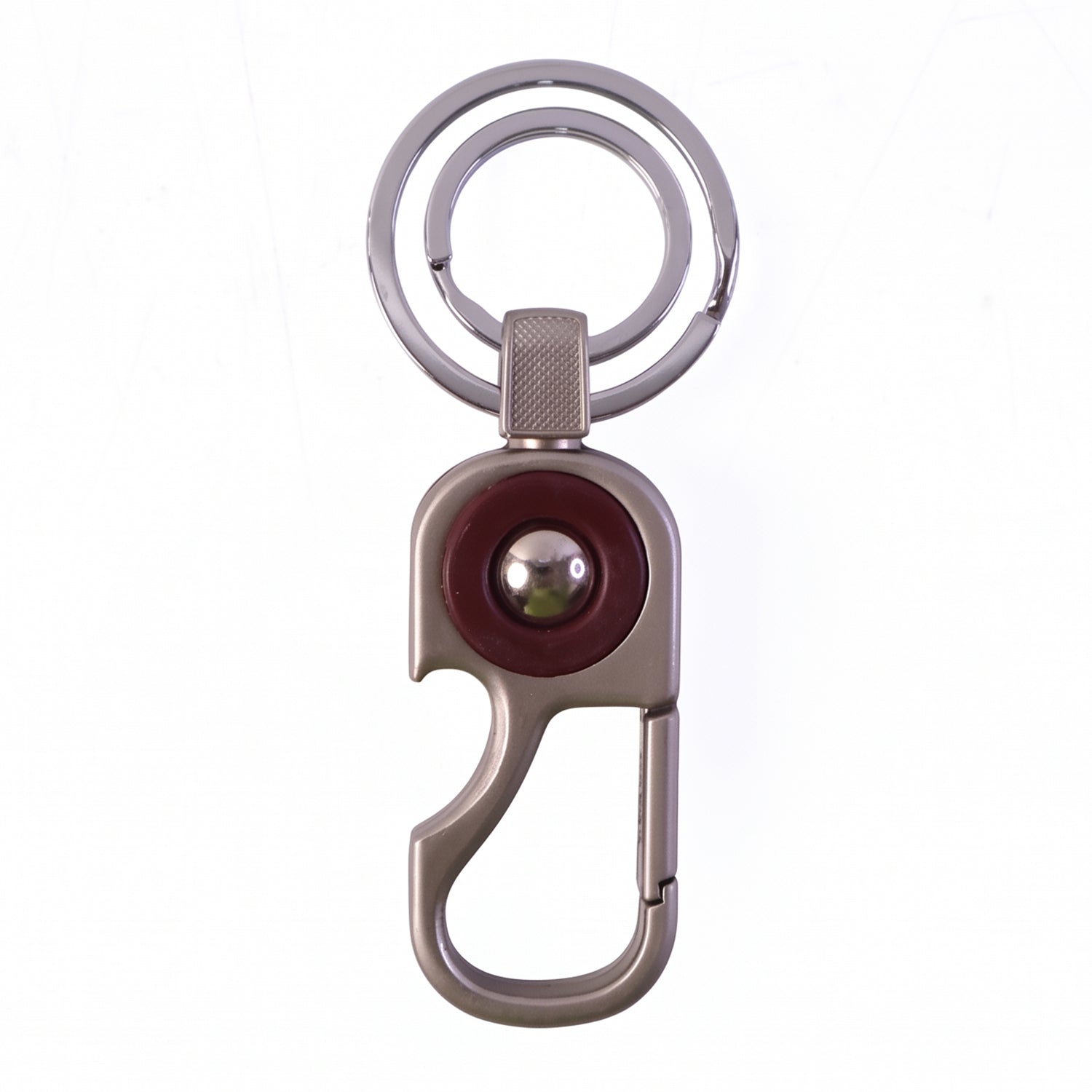 Modern design metal key holder that clips easily onto belts and bags.