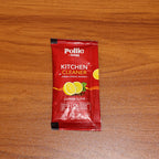 Pollic Kadam Kitchen Cleaner sachet paired with spray bottle for easy cleaning