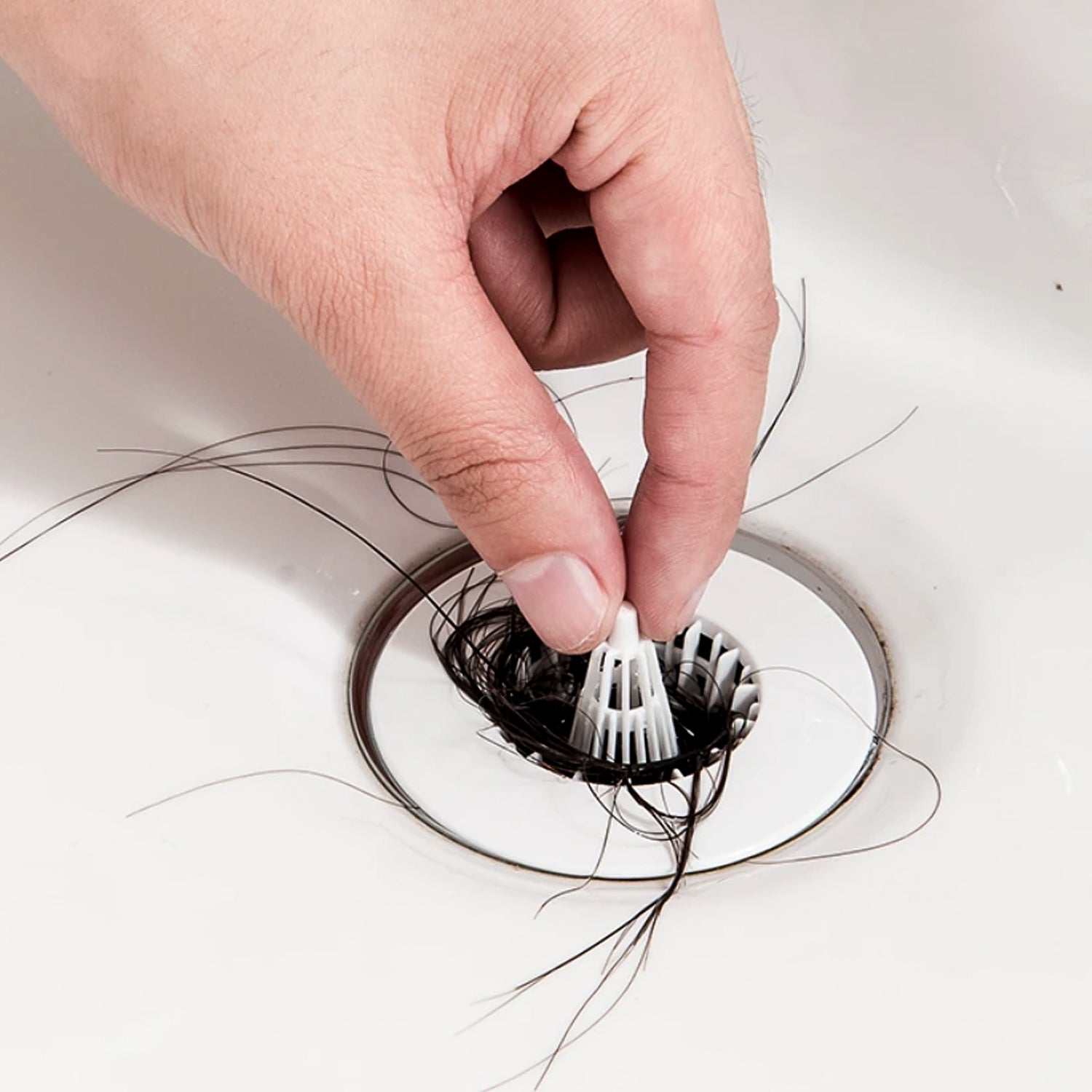 Close-up of hair trap strainer filter for sink drains