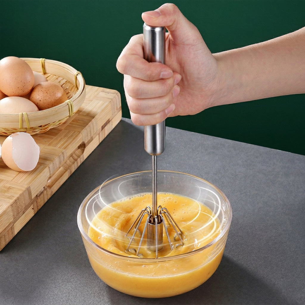 Manual egg beater and whisk tool in stainless steel