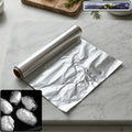 Heavy-duty aluminium foil roll for kitchen use in stainless steel dispenser