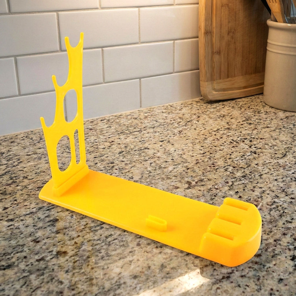 The plastic kitchen knife stand neatly displayed in a modern kitchen setting.
