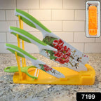 Side view of the plastic knife stand holding various kitchen knives, demonstrating its storage capacity.