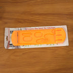 Lifestyle shot of the plastic knife stand holding a variety of kitchen knives, ready for use.