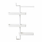 Rotating storage rack filled with kitchen items demonstrating storage capacity