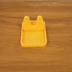 Kitchen lid and spoon holder stand in use with utensils and lids