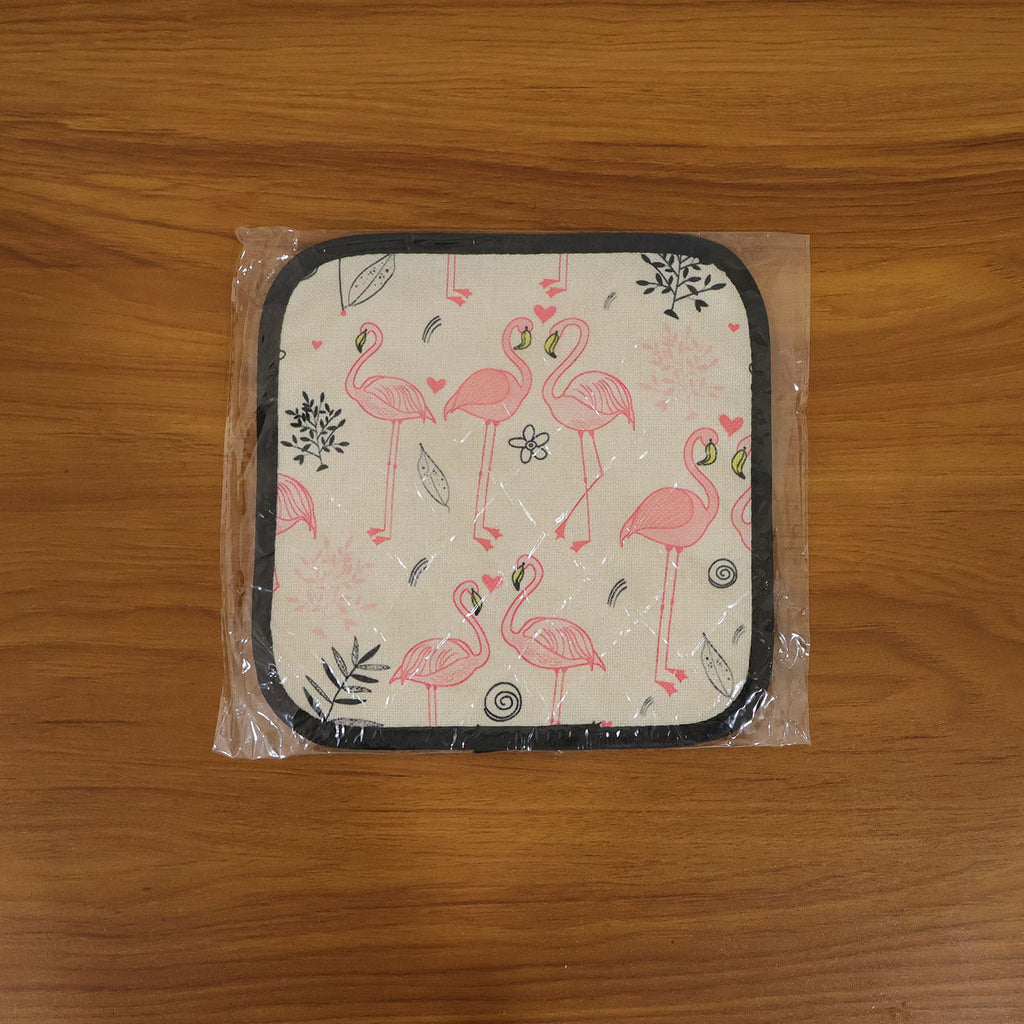 Printed heat resistant kitchen pot holder mat actively used in kitchen