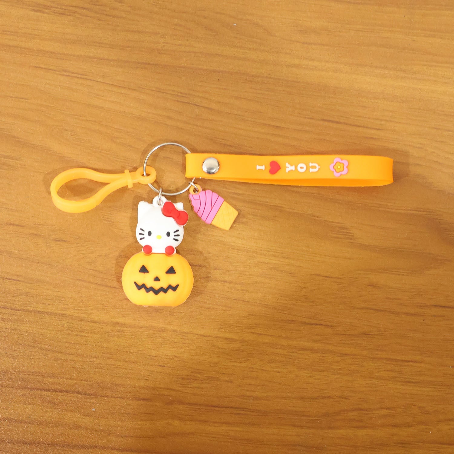 Stylish kitty pumpkin accessory as keychain or bag charm