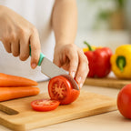 Ergonomic kitchen knife with mint green handle for safe, precise cutting