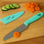Kitchen knife blade highlighting sharp stainless steel edge
