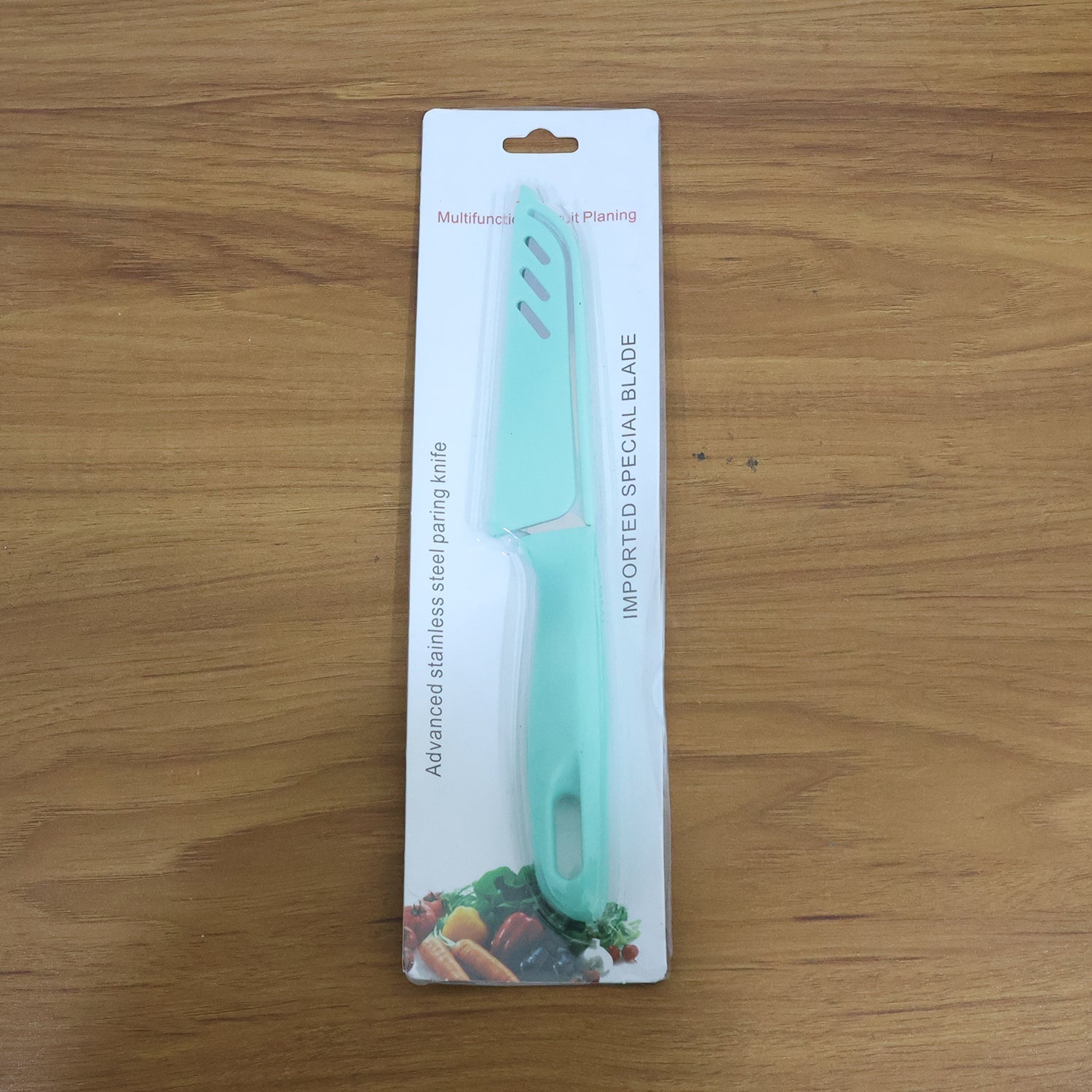 Full view of kitchen knife with ergonomic handle and protective blade cover