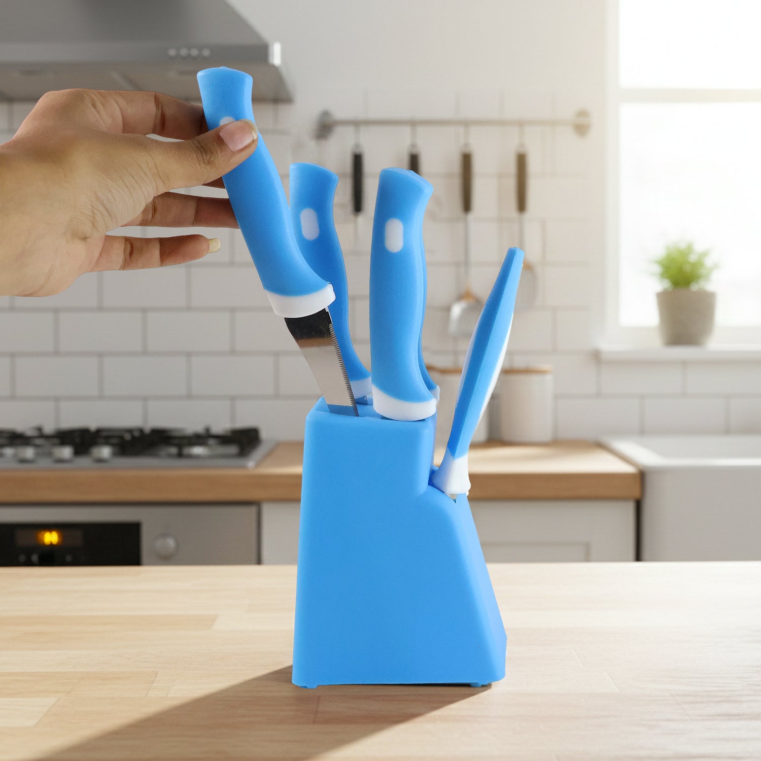 The 6-piece kitchen knife set securely displayed in its vibrant plastic stand.