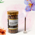 Loban Dhoop Sticks presented with traditional puja items like a diya and flowers.