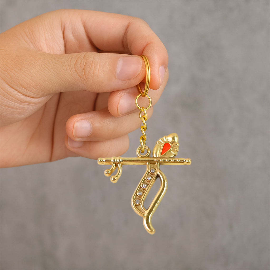 Side angle of Krishna metal keychain showing elegant metal finish