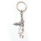 Compact devotional Krishna flute metal keychain in stainless steel