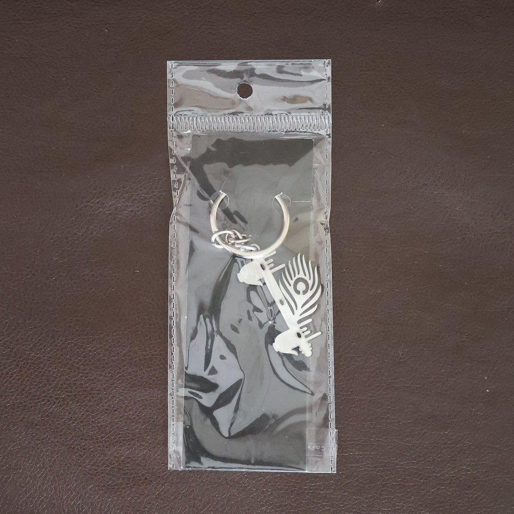 Krishna Flute Keychain displayed in a lifestyle setting, perfect for daily use.