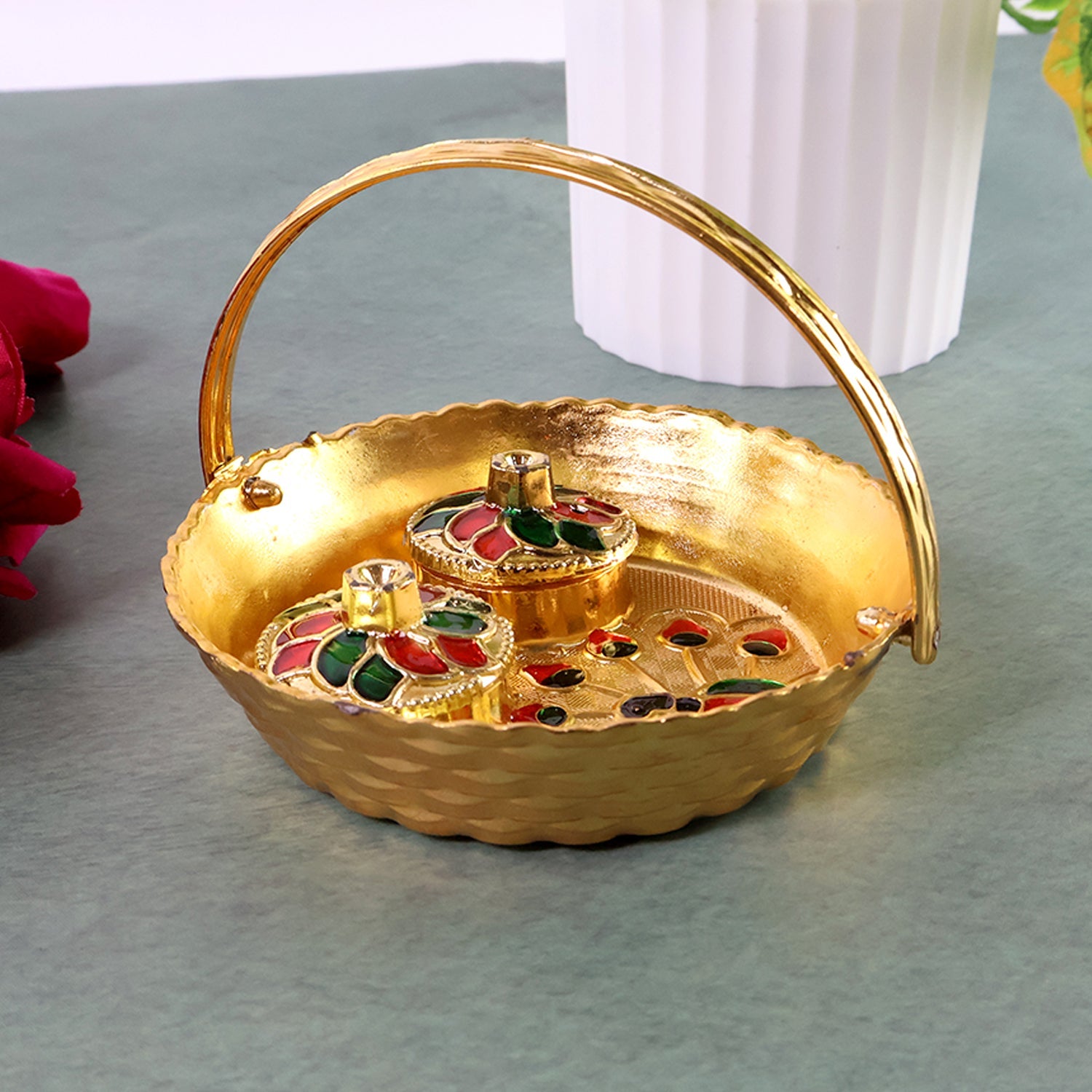 Close-up of the intricate peacock meenakari design on the pooja tray.