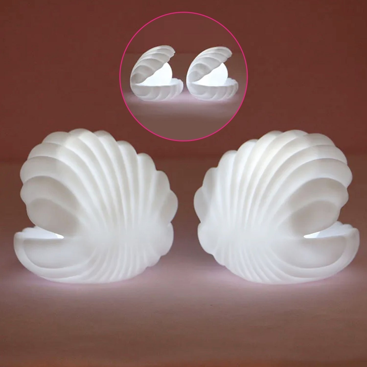 A child's hand reaching for the gentle glow of the Pearl Shell Night Lamp.