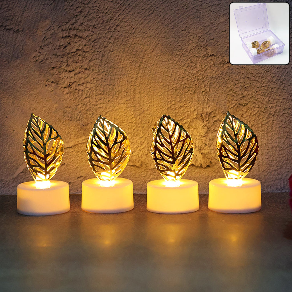 Golden leaf LED candles glowing softly on a dark surface, highlighting intricate details.