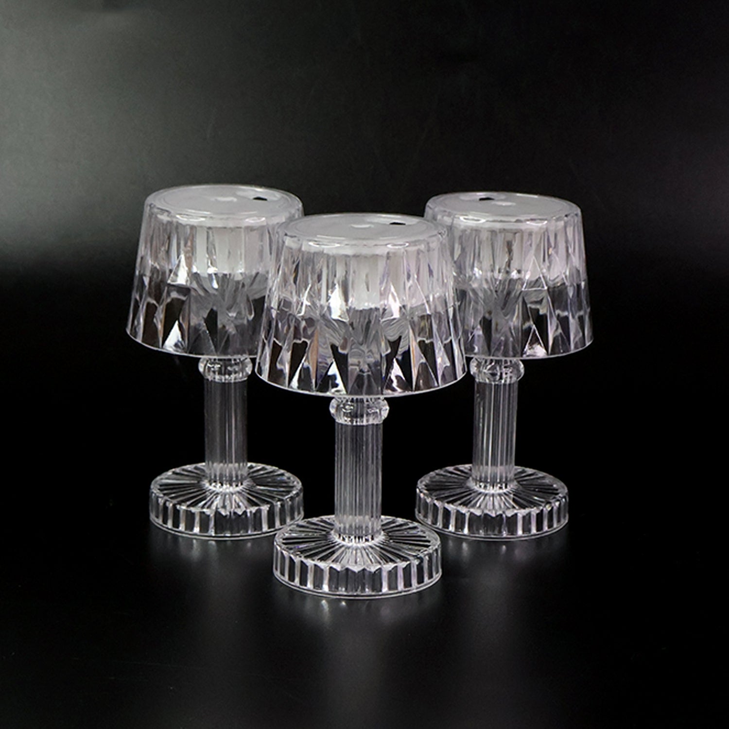 Decorative LED mini table lamp set emitting warm flickering light for romantic settings