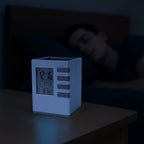 Side view of multifunction digital desk clock with easy control buttons
