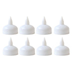 Close up of round LED flameless tealight candle showcasing smooth design and warm light