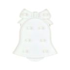 Battery operated LED Bell Shaped Night Light placed on bedside table