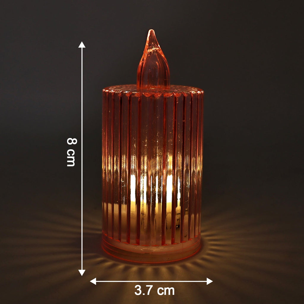 Warm flickering LED tea light candles in decorative holders