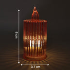 Warm flickering LED tea light candles in decorative holders