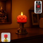 Lotus shaped LED flameless candle emitting warm glowing light on decorative holder