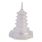 Illuminated crystal pagoda decorative lamp showing warm LED glow