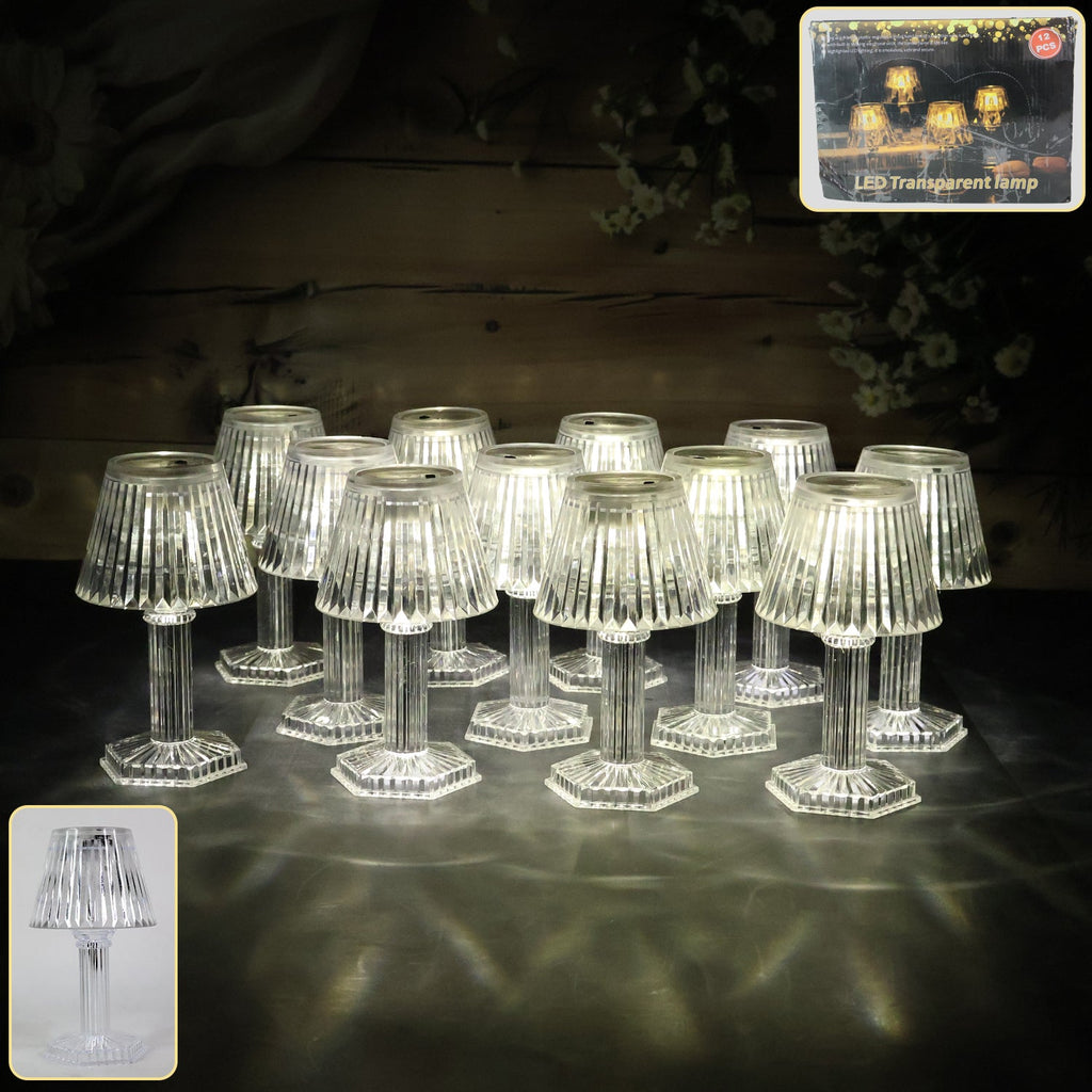 Crystal style LED table lamp with warm yellow glow on a table