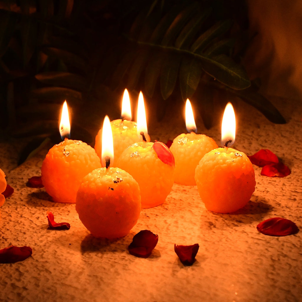 Six-piece set of traditional Indian laddu wax candles for celebration lighting