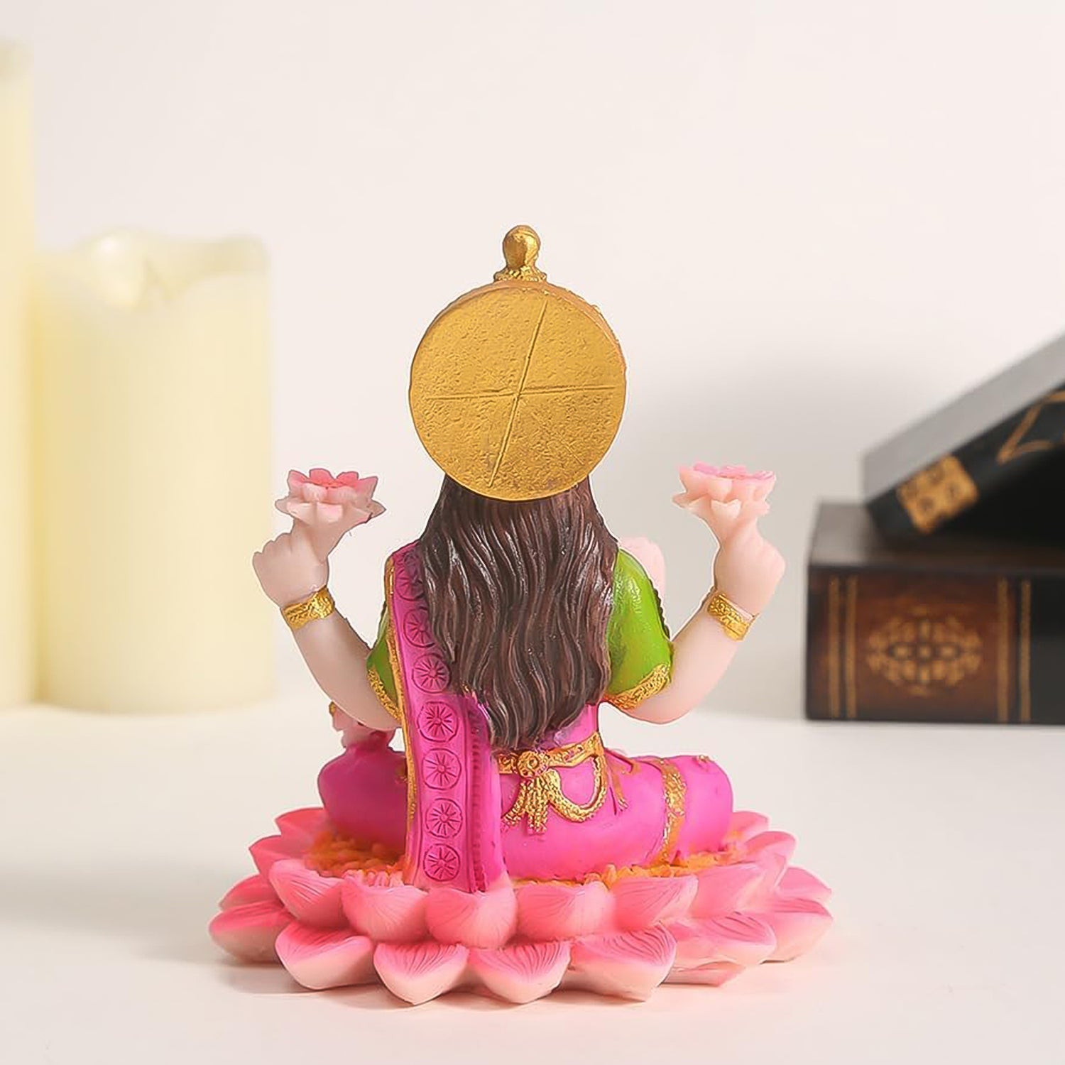 Artistic polyresin Lakshmi Mata idol seated on lotus with golden crown details