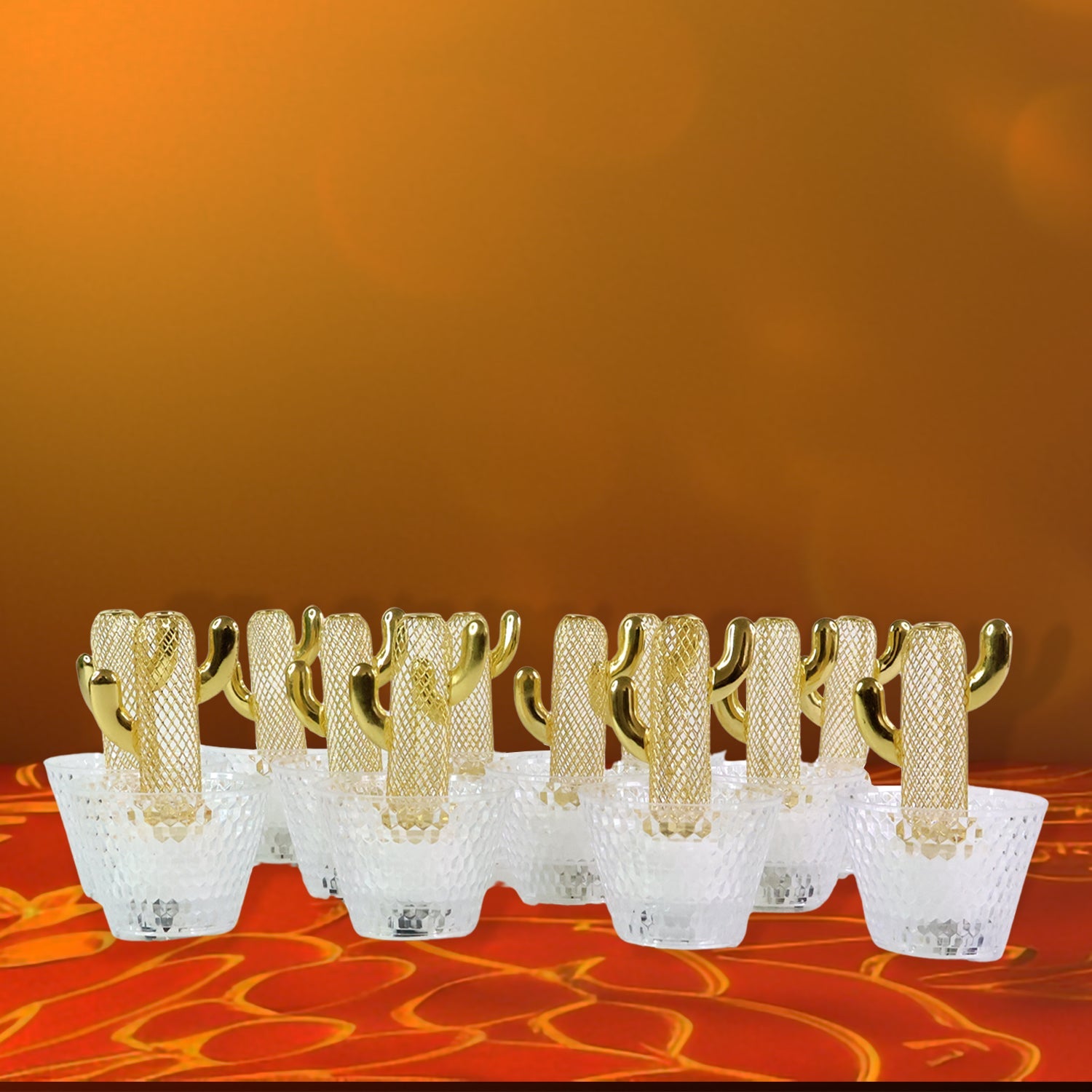 Close-up of decorative cactus LED tealight candle with warm glow